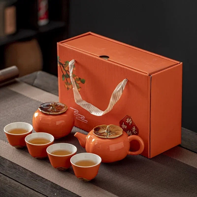 
                      
                        Persimmon Bounty: Handmade Porcelain Tea Set
                      
                    