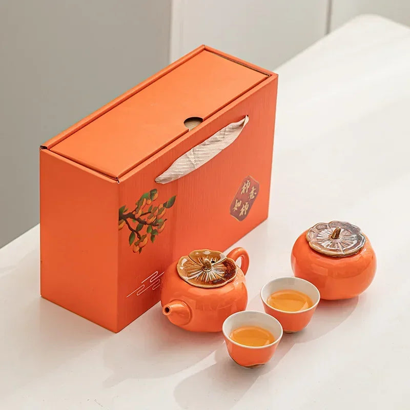 
                      
                        Persimmon Bounty: Handmade Porcelain Tea Set
                      
                    